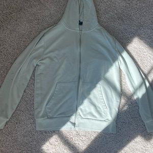 green zip up hoodie